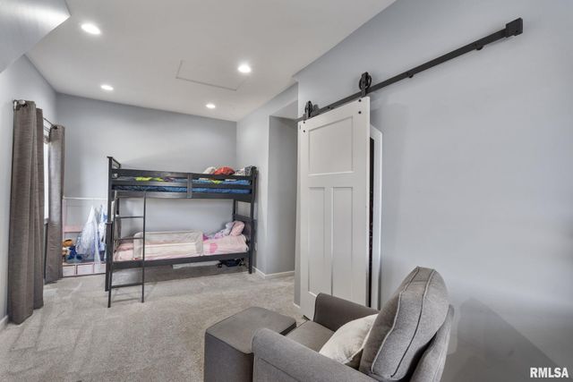 102 E GROVE Road, Long Grove, IA 52756