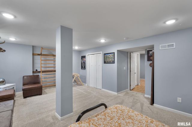 102 E GROVE Road, Long Grove, IA 52756