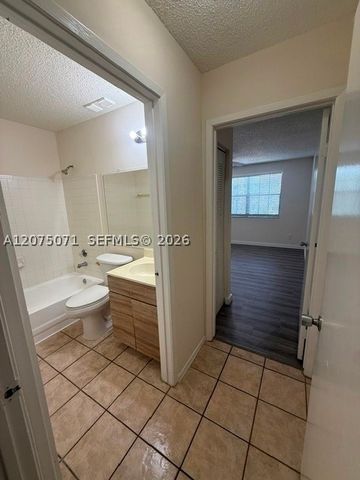 11229 W Atlantic Blvd 305, Coral Springs, FL 33071