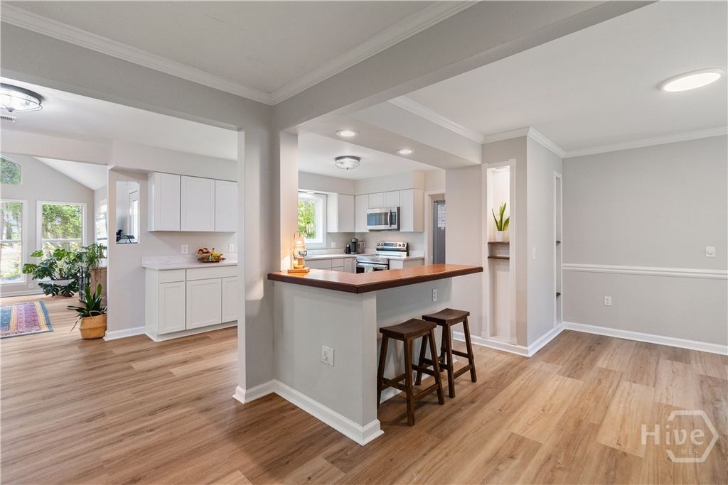 Image 11 of property listing at 411 Tivoli Marsh Road, Richmond Hill, GA 31324