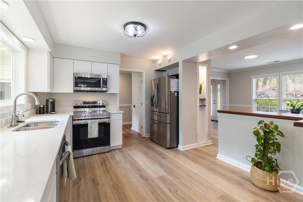 Image 21 of property listing at 411 Tivoli Marsh Road, Richmond Hill, GA 31324