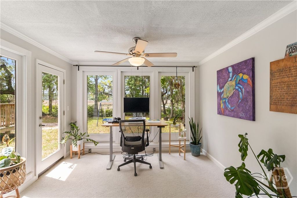 Image 27 of property listing at 411 Tivoli Marsh Road, Richmond Hill, GA 31324