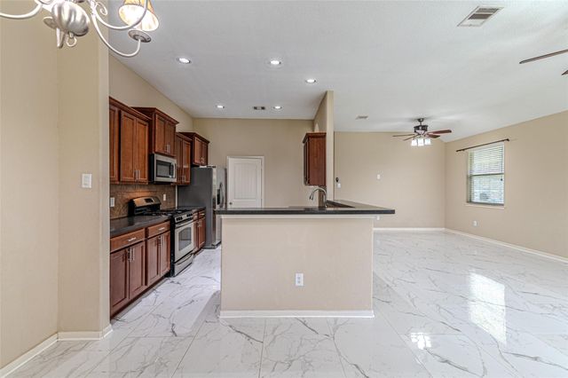 8619 Debbie Terrace Drive, Cypress, TX 77433