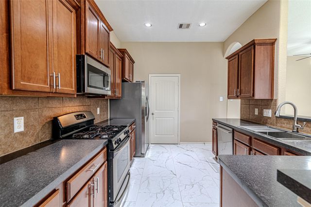 8619 Debbie Terrace Drive, Cypress, TX 77433