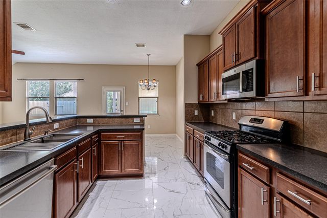 8619 Debbie Terrace Drive, Cypress, TX 77433