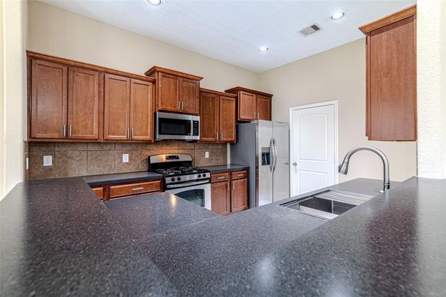 8619 Debbie Terrace Drive, Cypress, TX 77433