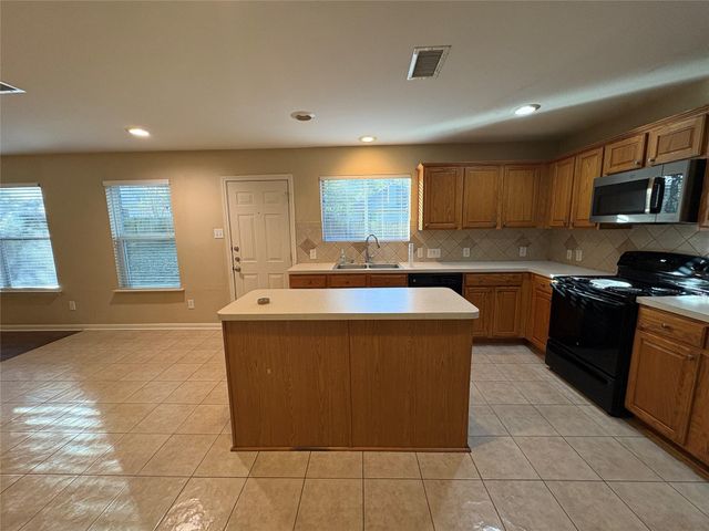 126 W Drifting Shadows Circle, Conroe, TX 77385