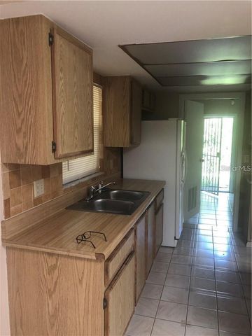12106 CLUB WOODS DRIVE, Orlando, FL 32824
