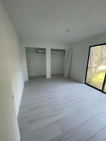 14297 SW 94th Cir Ln 104-28, Miami, FL 33186