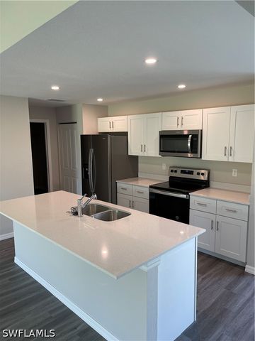 609 NW 25th ST, Cape Coral, FL 33993