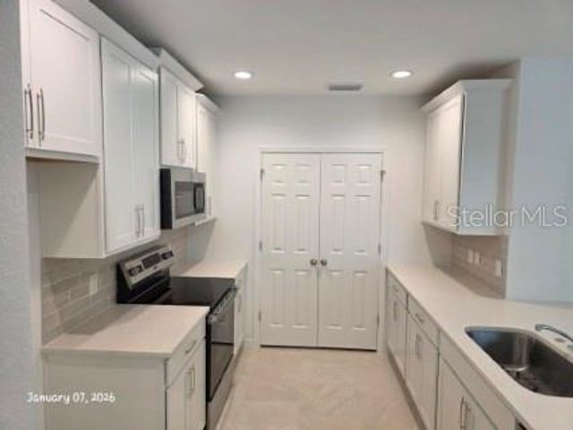 1337 SAWGRASS HAMMOCK LANE, Davenport, FL 33837