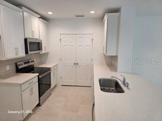 1337 SAWGRASS HAMMOCK LANE, Davenport, FL 33837