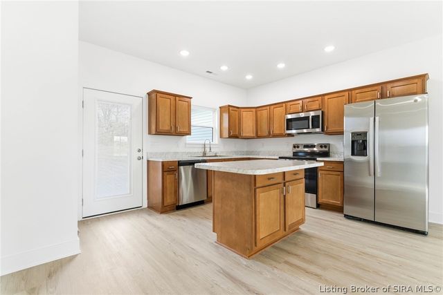 6002 Red Berry Juniper Drive, Charlestown, IN 47111