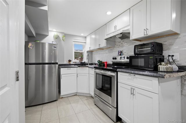 32 Landscape Drive, Wheatley Heights, NY 11798