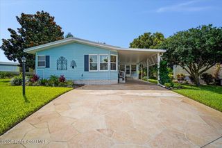 206 Cobia Court, Barefoot Bay, FL 32976