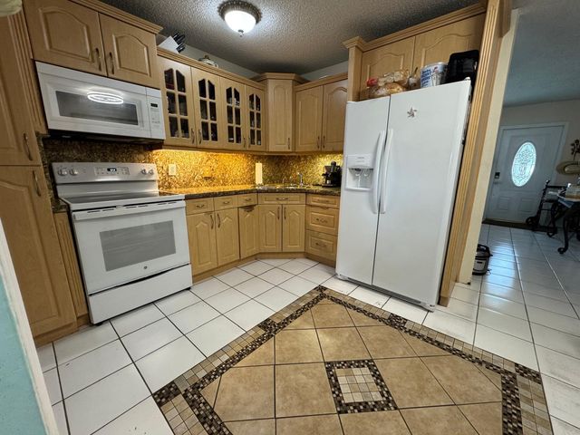 966 Sumter Road E, West Palm Beach, FL 33415