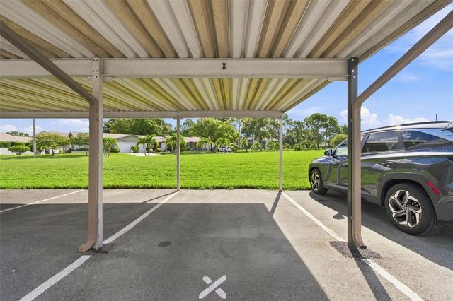 1370 HEATHER RIDGE BOULEVARD 104, Dunedin, FL 34698
