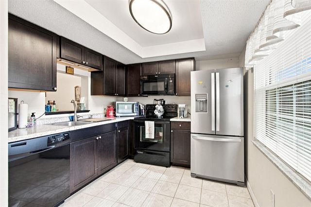 1370 HEATHER RIDGE BOULEVARD 104, Dunedin, FL 34698