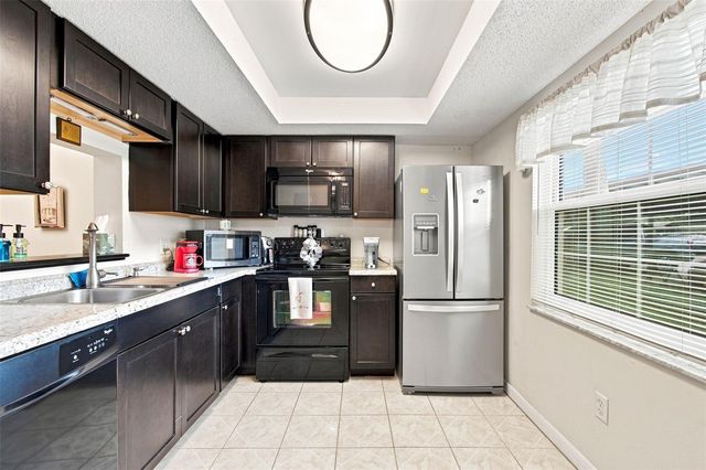 1370 HEATHER RIDGE BOULEVARD 104, Dunedin, FL 34698