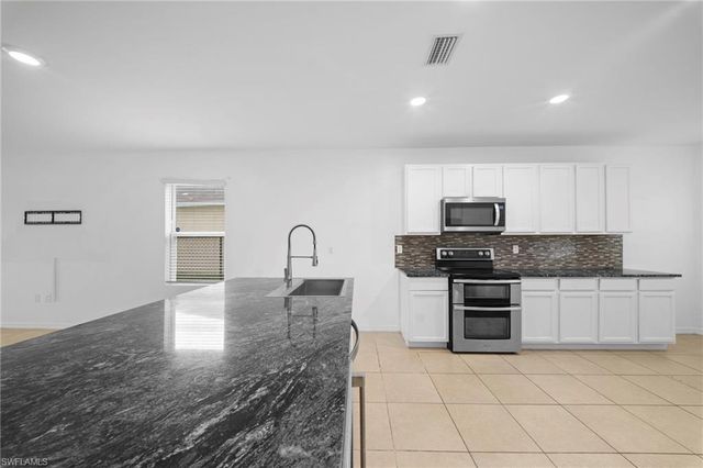 10464 canal brook LN, Lehigh Acres, FL 33936