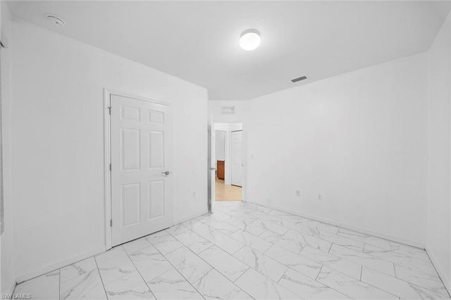 10464 canal brook LN, Lehigh Acres, FL 33936
