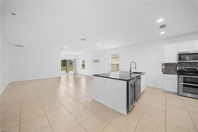 10464 canal brook LN, Lehigh Acres, FL 33936
