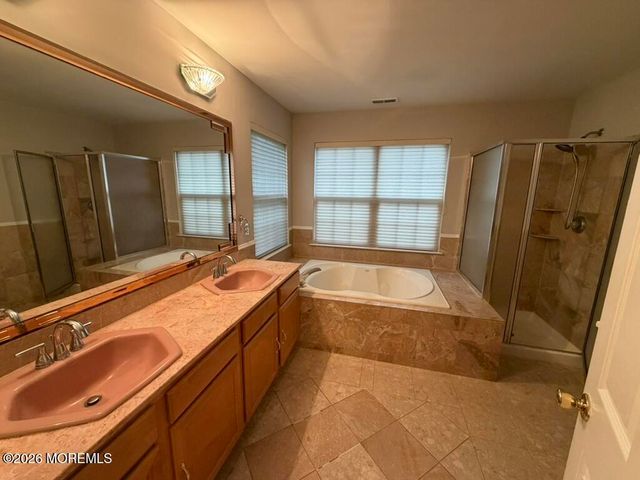222 Hidden Lake Drive, Morganville, NJ 07751