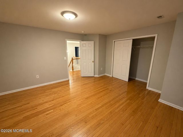 222 Hidden Lake Drive, Morganville, NJ 07751