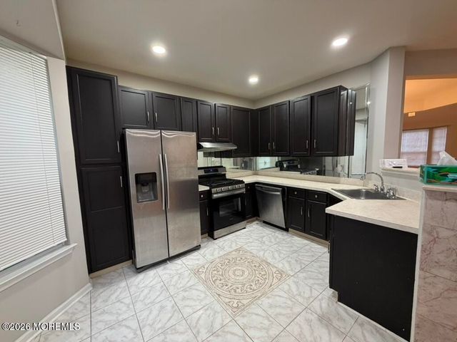 222 Hidden Lake Drive, Morganville, NJ 07751