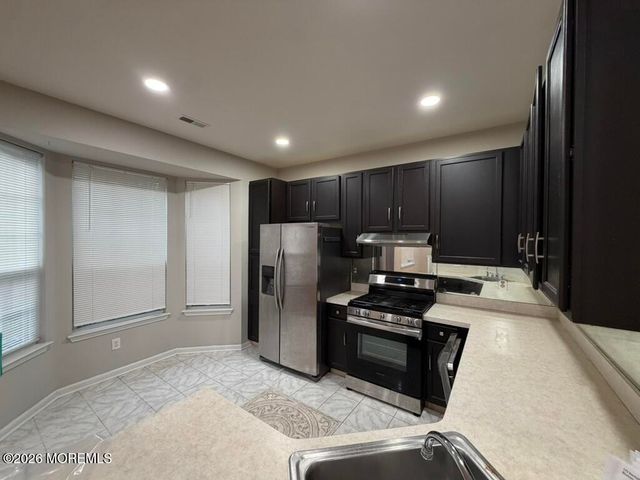 222 Hidden Lake Drive, Morganville, NJ 07751