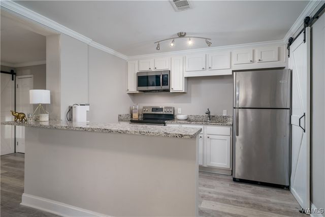 1402 9TH 11, Tuscaloosa, AL 35401