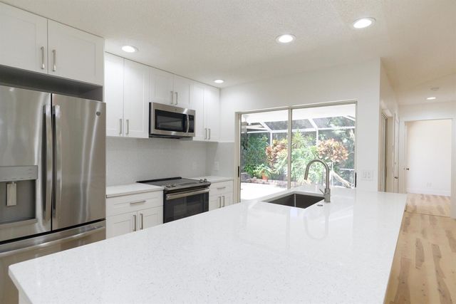 1202 Silverleaf Oak Court, Palm Beach Gardens, FL 33410