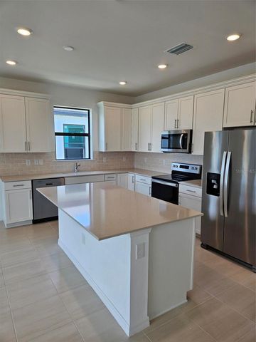2177 LAURIFOLIA COURT, North Port, FL 34289