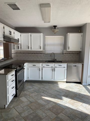 990 Camden Drive, Lewisville, TX 75067
