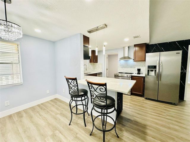 8203 OLIVEWOOD PLACE, Tampa, FL 33615