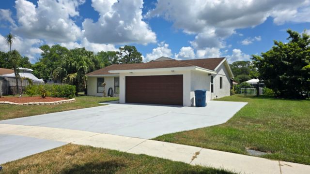 118 CAMBRIDGE Lane, Royal Palm Beach, FL 33411
