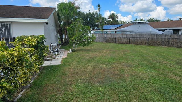 118 CAMBRIDGE Lane, Royal Palm Beach, FL 33411