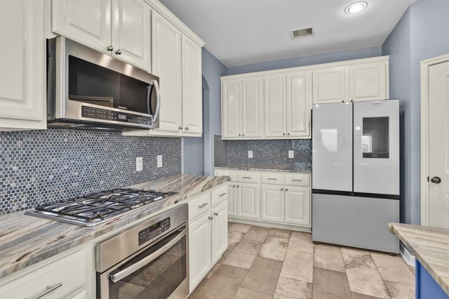 31710 Sydney Creek Drive, Hockley, TX 77447