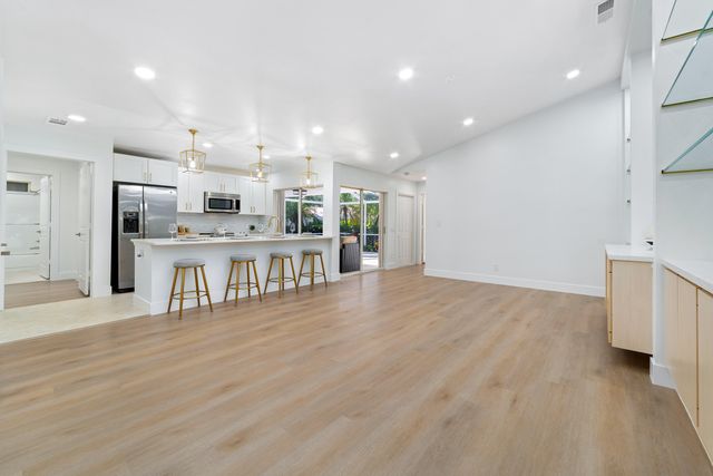 2301 PIN OAK Court, Palm Beach Gardens, FL 33410