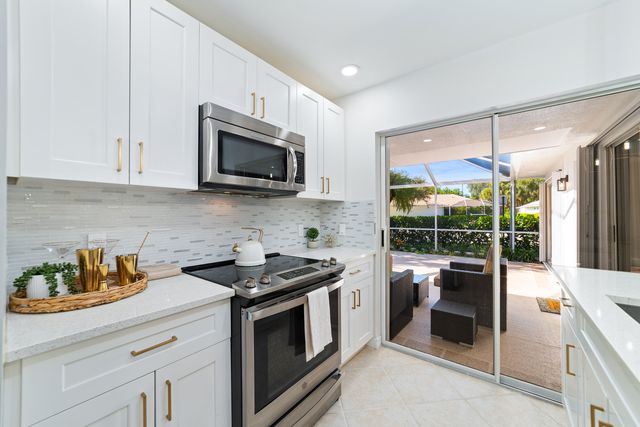 2301 PIN OAK Court, Palm Beach Gardens, FL 33410