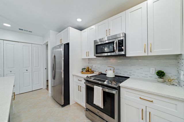 2301 PIN OAK Court, Palm Beach Gardens, FL 33410