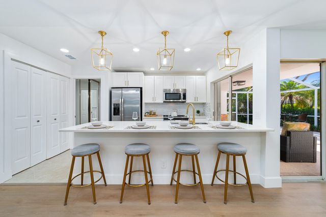 2301 PIN OAK Court, Palm Beach Gardens, FL 33410