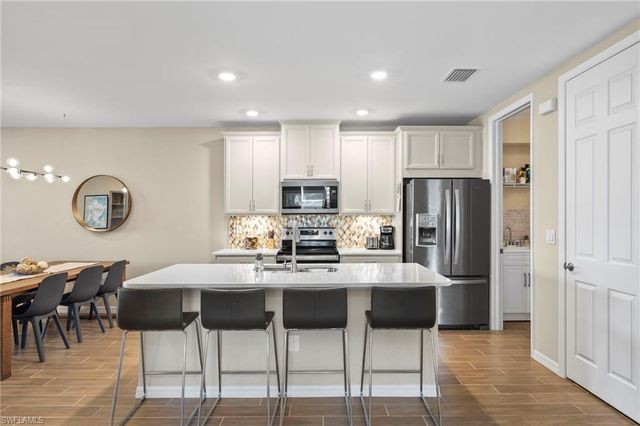 14644 Edgewater CIR, Naples, FL 34114