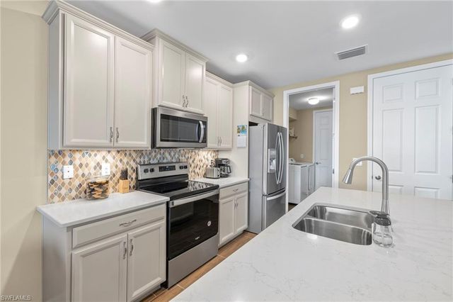 14644 Edgewater CIR, Naples, FL 34114