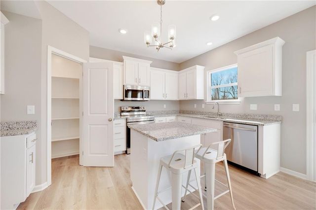 600 Wild Lupine Lane, Raymore, MO 64083