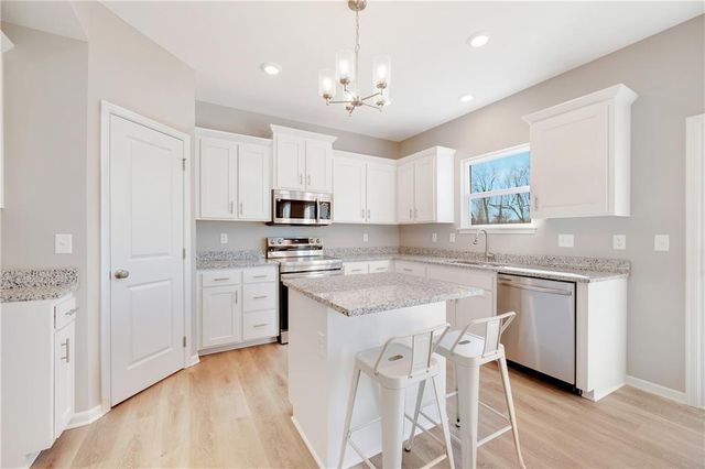 600 Wild Lupine Lane, Raymore, MO 64083