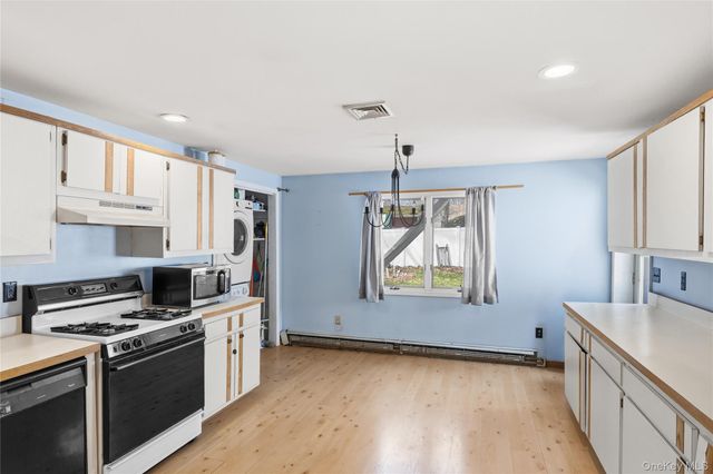 92 Wauwepex Trail, Ridge, NY 11961