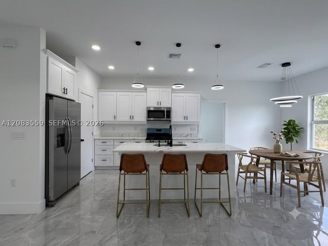 852 Belden Ave, Lehigh Acres, FL 33974
