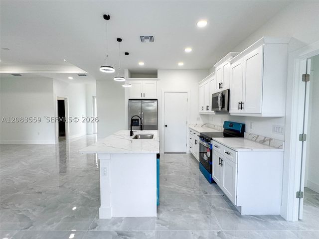 852 Belden Ave, Lehigh Acres, FL 33974