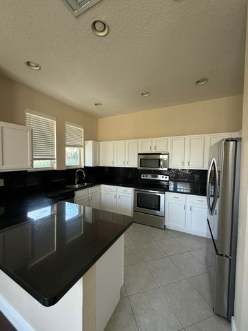 499 Corte Madera Lane 1, West Palm Beach, FL 33401